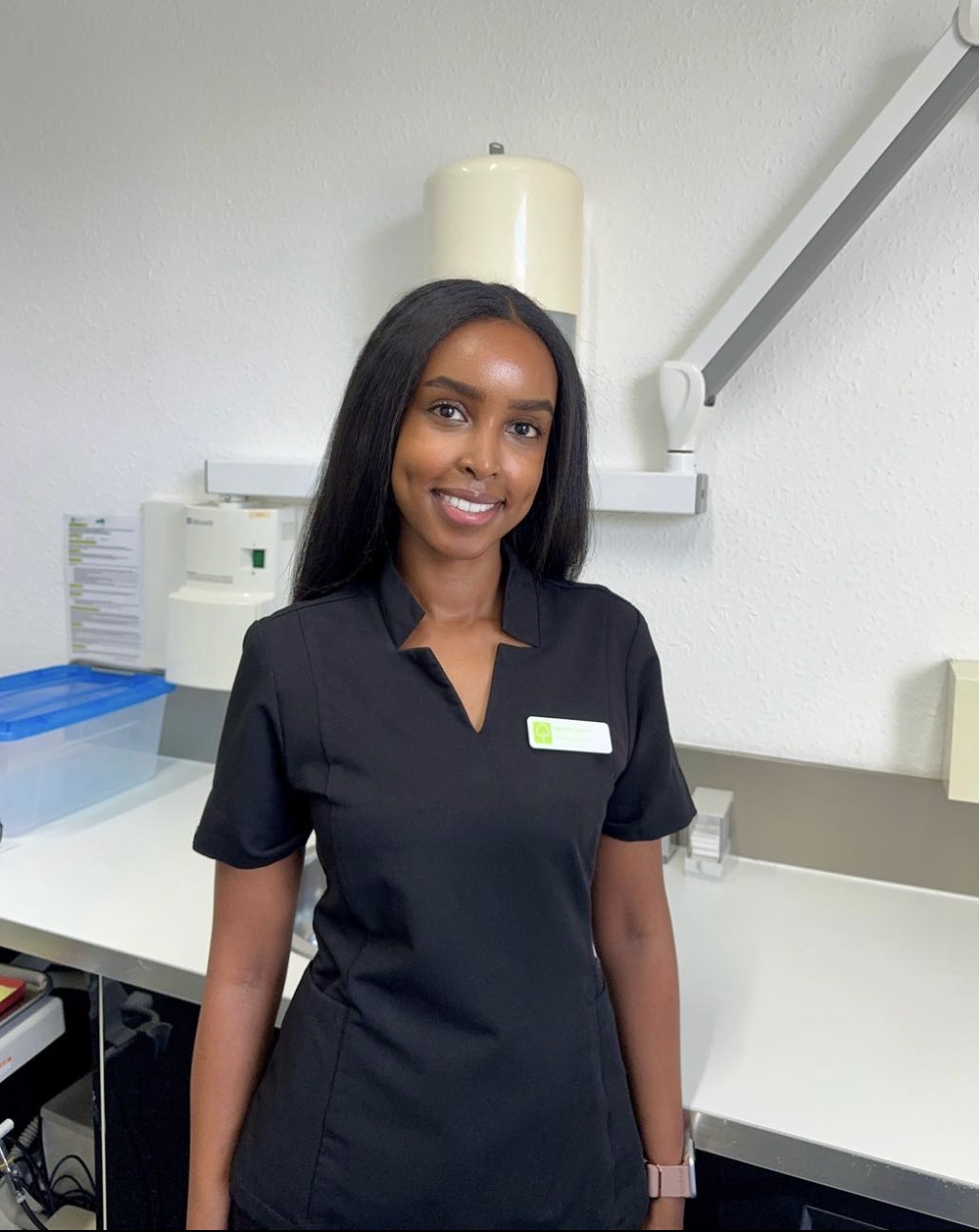 Dr Mariam Samra in black scrubs in the surgery